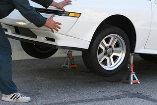 Illustration for article titled And You Will Know Us by the Trail of Parts: Using a Floor Jack and Jack Stands